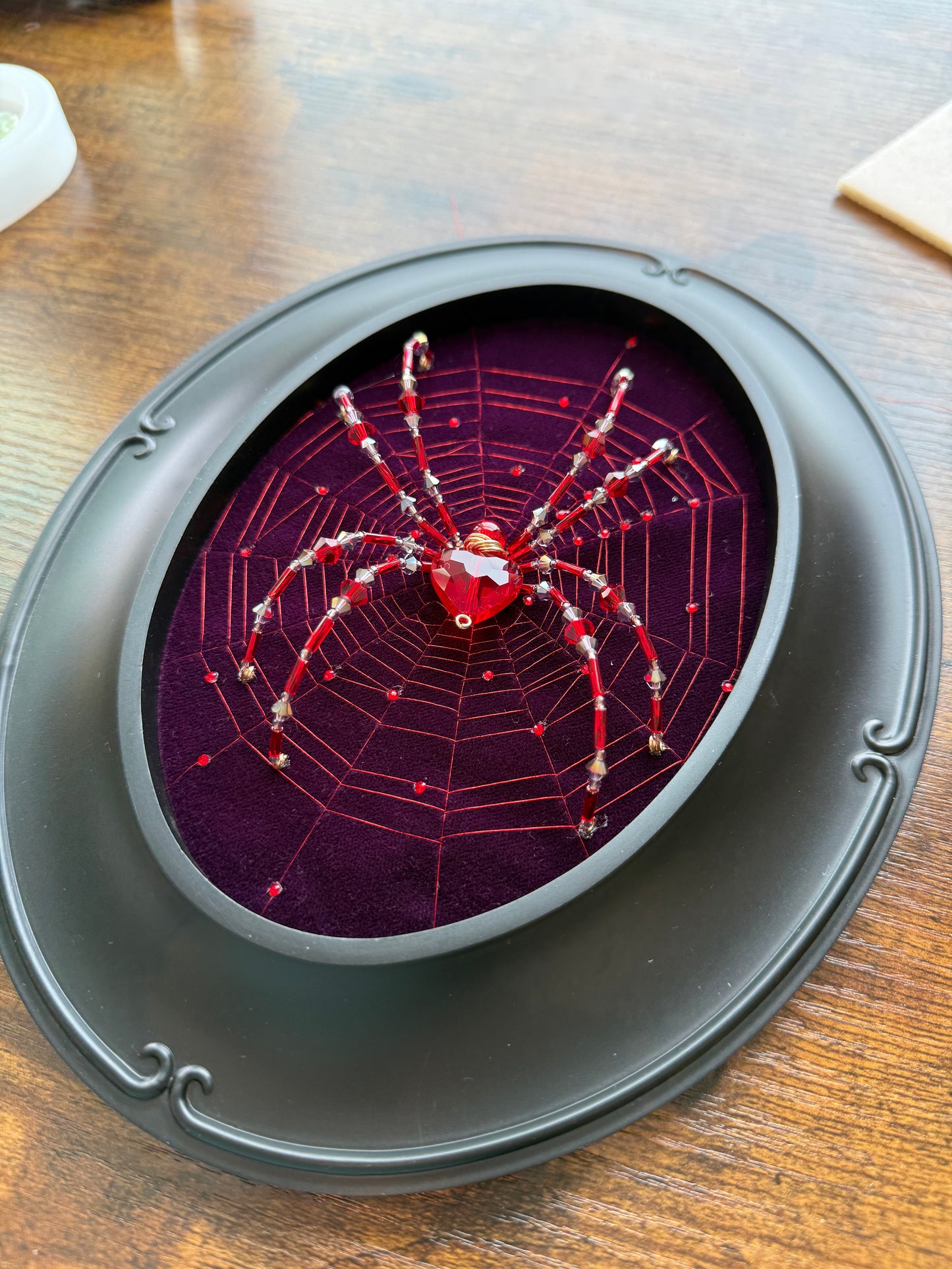 Red heart framed spider