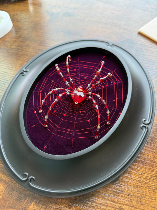 Red heart framed spider