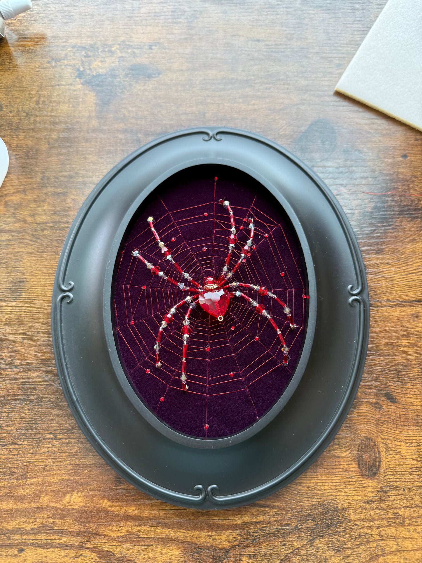 Red heart framed spider